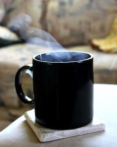 Public Domain. (From http://www.photos-public-domain.com/2011/10/27/steam-rising-from-cup-of-hot-tea/). Coffee, tea, steam, cup, mug, cafe.